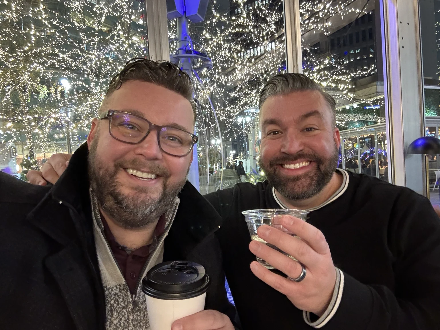 Steve and CJ enjoying an evening in downtown Detroit beneath holiday lights