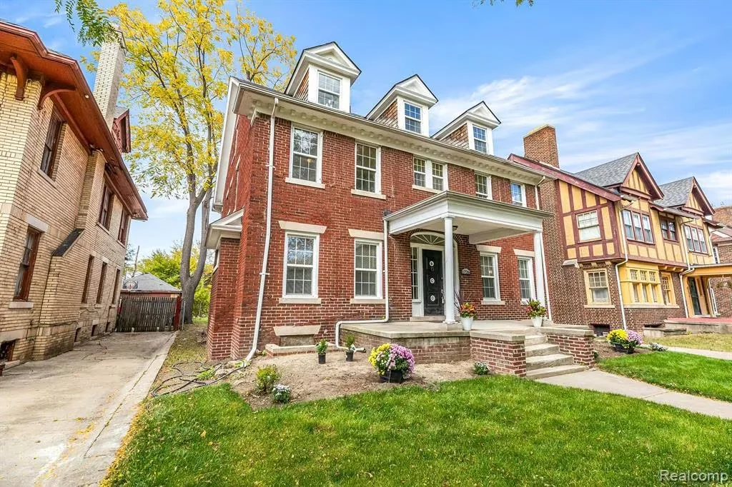 The 1919 Detroit house as Steve and CJ first encountered it before their own exterior work