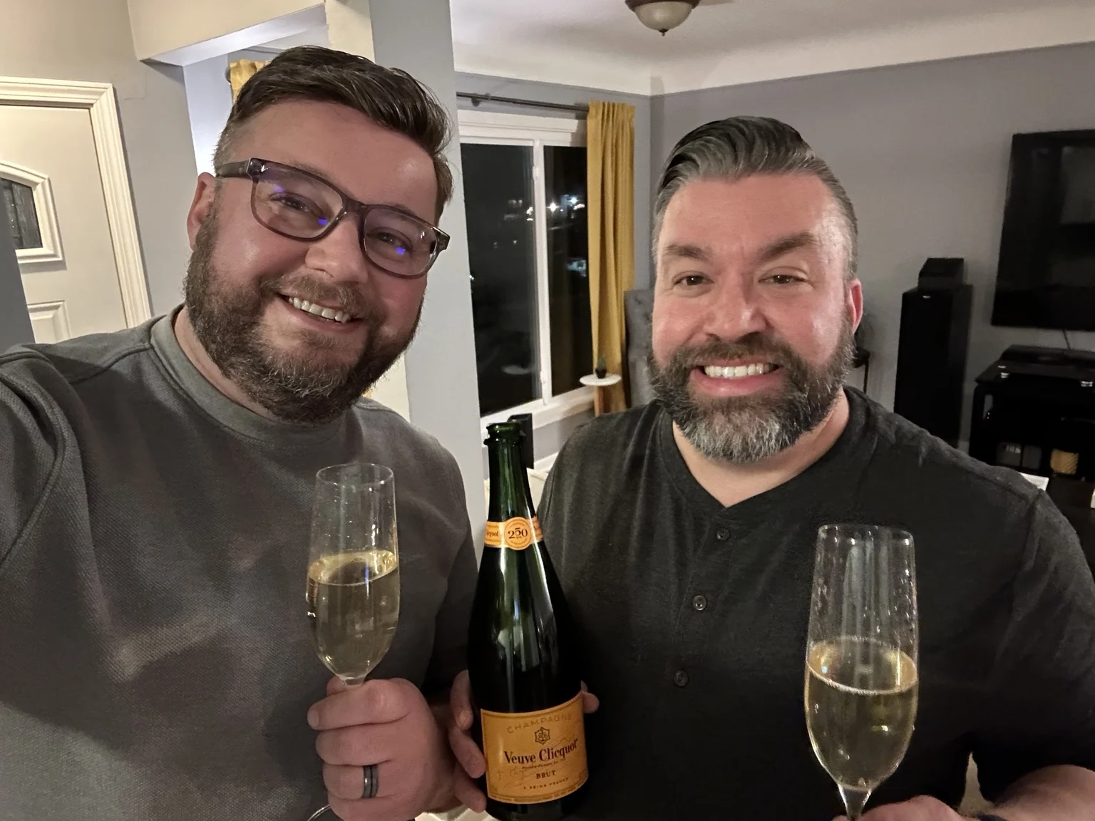 Champagne celebration after Steve and CJ's home offer was accepted