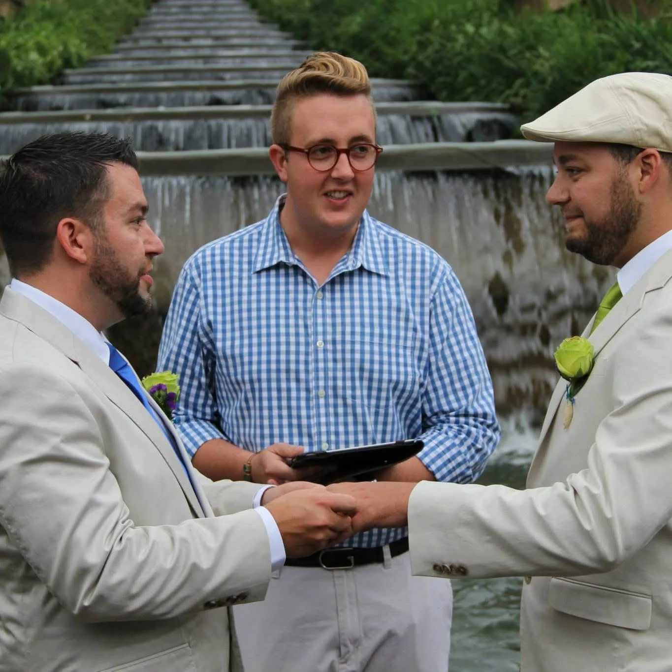 Steve and CJ holding hands during their 2013 wedding ceremony in Washington, D.C.