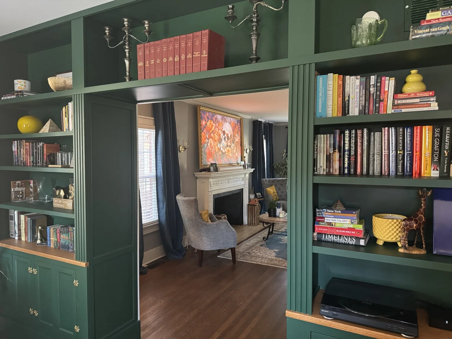 Angled detail of finished library built-ins looking into the living room