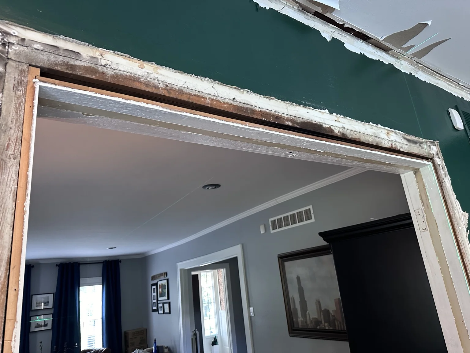 Original trim removed from the wide passage during the library built-in installation